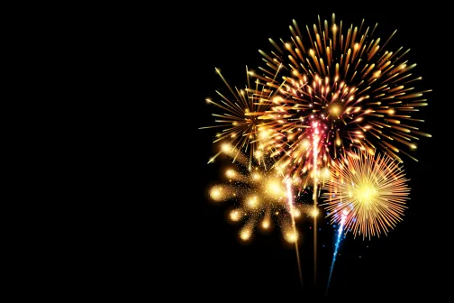 A collection of colorful fireworks exploding against a black background